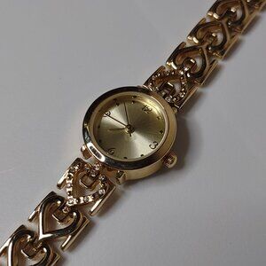 Cute Gold Tone Allude Watch With Heart Band